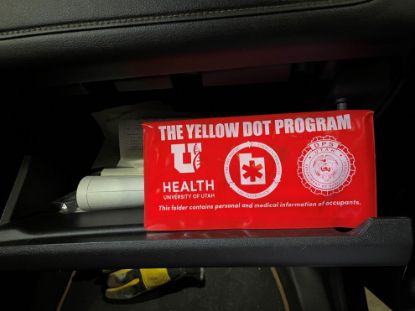 Yellow dot packet placed in glove box